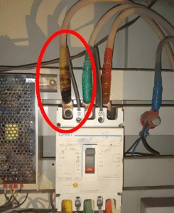 Overheating and burn damage caused by loose installation of 6 AWG terminal blocks